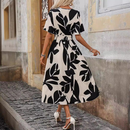 Elegantní šaty s potiskem a kříženým výstřihem Zarusova
