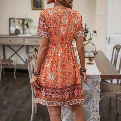 Letní áčkové šaty Zarusova s květinovým vzorem v boho stylu