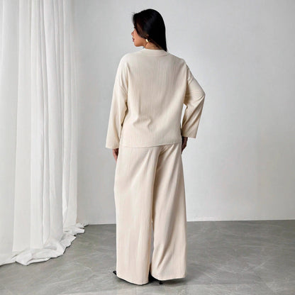 Elegantní meruňková sedací souprava Zarusova Womenswear