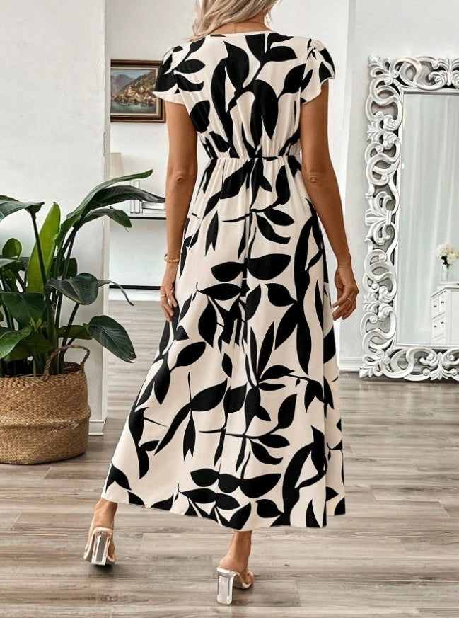 Elegantní maxi šaty s výstřihem do V od Zarusova