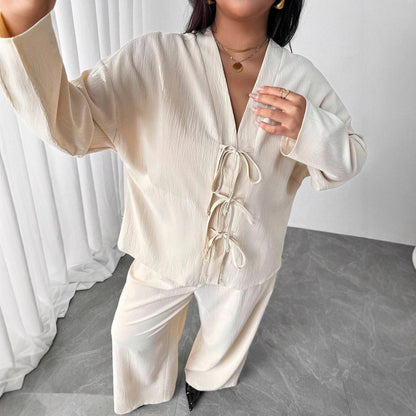 Elegantní meruňková sedací souprava Zarusova Womenswear