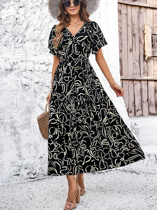 Elegantní geometrické midi šaty Zarusova s krátkým rukávem