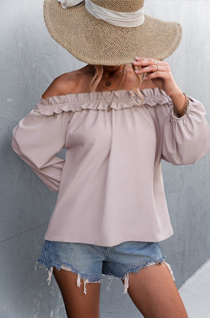 Elegantní top s odhalenými rameny a rukávy v tvaru lampionu od Zarusova