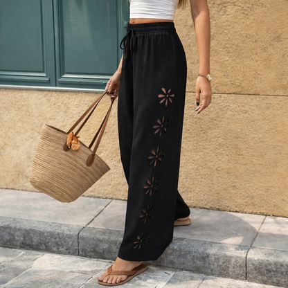 Elegantní kalhoty Zarusova s květovaným výřezem a stahovací šňůrkou