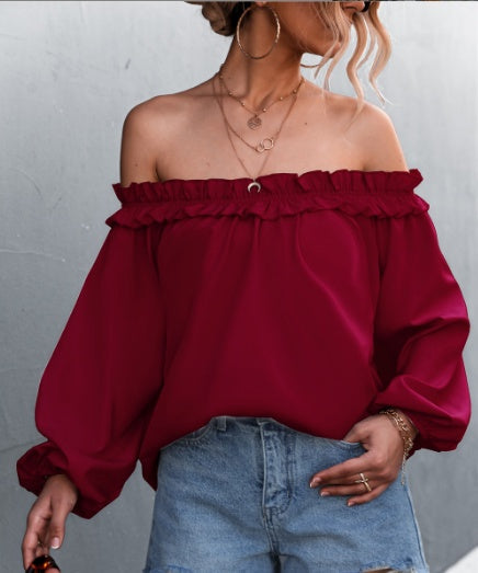Elegantní top s odhalenými rameny a rukávy v tvaru lampionu od Zarusova